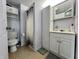 Functional bathroom with white fixtures, a shower, and a neutral tile floor at 600 S Oak St, Fortville, IN 46040