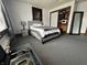 Cozy bedroom with a plush bed, closet, and carpeted floors at 600 S Oak St, Fortville, IN 46040