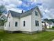 Well-kept home showcasing traditional siding, neat landscaping, and a cozy, inviting appeal at 600 S Oak St, Fortville, IN 46040
