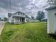 Traditional house featuring a well-maintained front lawn at 600 S Oak St, Fortville, IN 46040