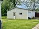 View of the exterior of a white detached garage at 600 S Oak St, Fortville, IN 46040