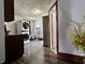 Hallway featuring a washer and dryer with access to other rooms in the home at 600 S Oak St, Fortville, IN 46040