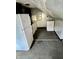 This kitchen features appliances, compact storage, and lots of potential, but needs TLC and updates at 600 S Oak St, Fortville, IN 46040