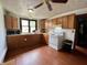 Functional kitchen equipped with appliances and wooden cabinetry at 600 S Oak St, Fortville, IN 46040