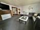 Spacious living room featuring an ample seating arrangement and a cozy fireplace at 600 S Oak St, Fortville, IN 46040