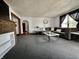 Inviting living room boasting ample seating, stylish decor, and a warm ambiance at 600 S Oak St, Fortville, IN 46040