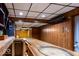 Basement bar with wine storage and seating at 6040 Manker St, Indianapolis, IN 46227