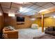 Basement den with TV, sofas, and carpeting at 6040 Manker St, Indianapolis, IN 46227
