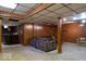 View of finished basement showing living area and bar at 6040 Manker St, Indianapolis, IN 46227