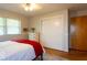 Bedroom with bed and carpet, featuring a closet and dresser at 6040 Manker St, Indianapolis, IN 46227