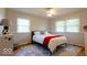 Bedroom with a comfortable bed, and a ceiling fan at 6040 Manker St, Indianapolis, IN 46227