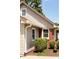 Tan siding with brick on single Gathering house at 6040 Manker St, Indianapolis, IN 46227