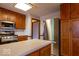 Spacious kitchen with wooden cabinets and stainless steel appliances at 6040 Manker St, Indianapolis, IN 46227