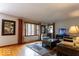 Cozy living room featuring hardwood floors and ample natural light at 6040 Manker St, Indianapolis, IN 46227