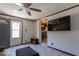 Living room with TV and view to dining table and kitchen at 6040 Manker St, Indianapolis, IN 46227