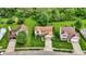 Aerial shot showcases the property's location and surrounding houses in a quiet residential neighborhood at 6609 Fountain Springs Blvd, Indianapolis, IN 46236