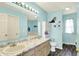 Bright bathroom featuring double sinks and vanity at 6609 Fountain Springs Blvd, Indianapolis, IN 46236