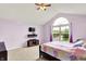 Bedroom with large window, vaulted ceiling, and carpet at 6609 Fountain Springs Blvd, Indianapolis, IN 46236