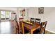 Inviting dining room showcasing a wooden table with lemons, with view to the living room at 6609 Fountain Springs Blvd, Indianapolis, IN 46236