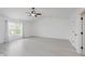 Bright bedroom with vaulted ceiling, hardwood floors, neutral walls, and natural light from window at 6703 Wimbledon Dr, Zionsville, IN 46077