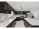 Spacious kitchen with island, stainless steel appliances, granite countertops, and a tiled backsplash at 6703 Wimbledon Dr, Zionsville, IN 46077