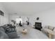 Bright living room with fireplace, dining area, and stylish decor at 6703 Wimbledon Dr, Zionsville, IN 46077