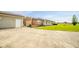 Wide driveway leading to a well-kept home with lovely landscaping at 6863 W Jennifer Ct, Greenfield, IN 46140