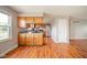 Bright eat-in kitchen featuring stainless steel appliances and natural wood cabinets at 6863 W Jennifer Ct, Greenfield, IN 46140