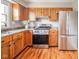 Well-equipped kitchen with stainless steel appliances and plenty of cabinet space at 6863 W Jennifer Ct, Greenfield, IN 46140