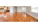 Spacious living area flowing into a well-equipped kitchen and adjacent hallway at 6863 W Jennifer Ct, Greenfield, IN 46140