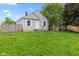Quaint single-story home featuring a cozy front yard, classic siding, and inviting curb appeal at 703 Kappes St, Indianapolis, IN 46221