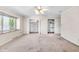 Bright bedroom featuring two closets, neutral paint, and ample space at 7035 Creekside Ln, Indianapolis, IN 46220