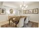 Elegant dining room featuring a large wooden table and decorative rug at 7887 Meadowbrook Dr, Indianapolis, IN 46240