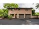 Spacious two-car garage exterior featuring a brick facade and an asphalt driveway at 7887 Meadowbrook Dr, Indianapolis, IN 46240