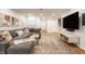 Finished basement with entertainment area with an oversized sectional sofa at 7887 Meadowbrook Dr, Indianapolis, IN 46240