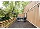 Deck featuring outdoor dining set with seating for four, perfect for entertaining guests at 8024 Sunfield Ct # 5-B, Indianapolis, IN 46214