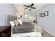 Comfortable bedroom featuring a ceiling fan and natural light at 8024 Sunfield Ct # 5-B, Indianapolis, IN 46214