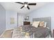 Bedroom featuring neutral walls, ceiling fan, and plush carpeting at 8024 Sunfield Ct # 5-B, Indianapolis, IN 46214