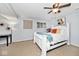 Bright bedroom with neutral walls, carpeted floor, and white-painted furniture at 8024 Sunfield Ct # 5-B, Indianapolis, IN 46214