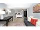 Spacious bedroom with a ceiling fan, neutral walls, and a comfortable seating area at 8024 Sunfield Ct # 5-B, Indianapolis, IN 46214