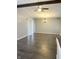 Open living room with hardwood floors and lots of natural light at 8024 Sunfield Ct # 5-B, Indianapolis, IN 46214