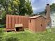 Fenced backyard featuring a storage shed and dog house at 8206 Bull Run Ct, Indianapolis, IN 46227