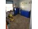 Neat bedroom with blue accents, exercise equipment, and plush carpeting providing a cozy and functional space at 852 Walnut St, Greenfield, IN 46140