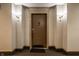 Condominium brown entry door at 8690 Jaffa Ct W Dr # 28, Indianapolis, IN 46260