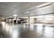 Well-lit parking garage with concrete floors and assigned parking at 8690 Jaffa Ct W Dr # 28, Indianapolis, IN 46260