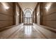 Hallway perspective with arch and marble floors at 8690 Jaffa Ct W Dr # 28, Indianapolis, IN 46260