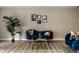 Sophisticated living room featuring modern decor, hardwood floors, and a tranquil atmosphere, perfect for relaxation at 8690 Jaffa Ct W Dr # 28, Indianapolis, IN 46260