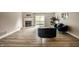 Stylish living room with a cozy fireplace and access to the outdoor space, great for relaxing and unwinding at 8690 Jaffa Ct W Dr # 28, Indianapolis, IN 46260