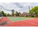 Community tennis court showing red and green color scheme at 8690 Jaffa Ct W Dr # 28, Indianapolis, IN 46260