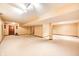Finished basement featuring neutral carpet, ceilings with spotlights and wooden doors at 9158 Oak Knoll Ln, Fishers, IN 46037